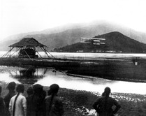 Charles Van den Born lifts off from the tidal flats of Sha Tin, making history as the pilot of Hong Kong's first powered flight.